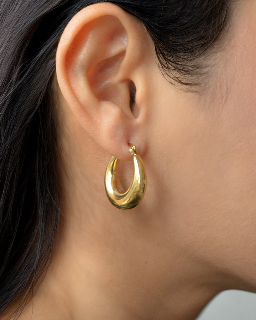 Lilo gold hoop earrings on ear – hypoallergenic and wearable daily