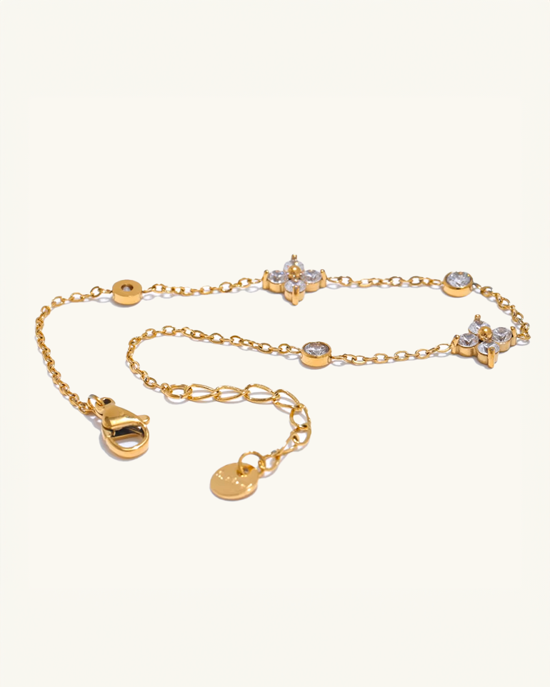 Close-up of butterfly charms and zircon settings – gold plated waterproof bracelet