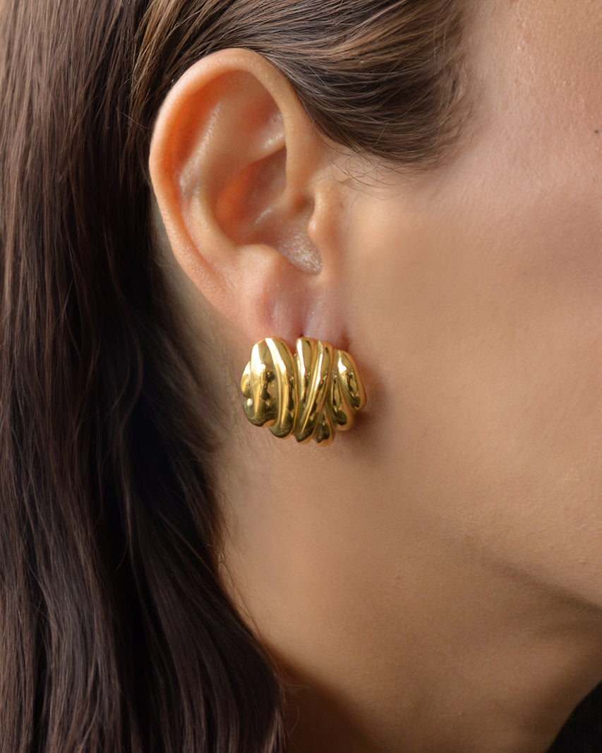 Lix chunky gold stud earrings on ear – textured, bold, and waterproof