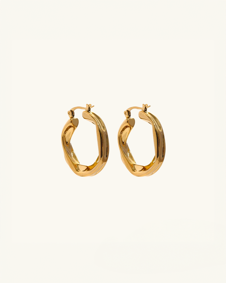 Twisted waterproof gold hoop earrings with a sculptural design