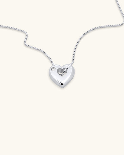 Close-up of April White Topaz Heart Pendant Necklace – White Gold Vermeil