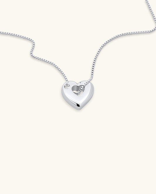 Close-up of April White Topaz Heart Pendant Necklace – White Gold Vermeil
