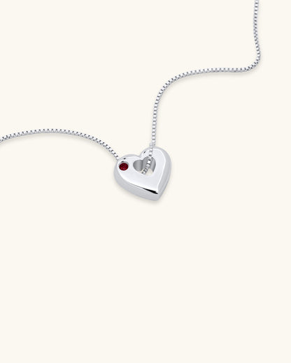 Close-up of January Garnet Heart Pendant Necklace – White Gold Vermeil