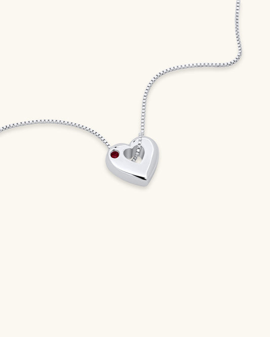Close-up of January Garnet Heart Pendant Necklace – White Gold Vermeil