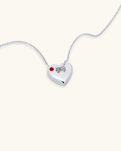 Close-up of July Ruby Heart Pendant Necklace – White Gold Vermeil