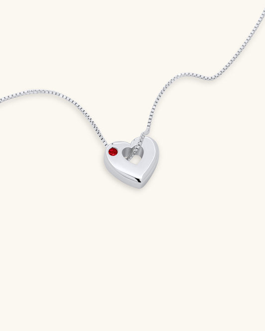 Close-up of July Ruby Heart Pendant Necklace – White Gold Vermeil