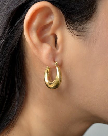 Lilo gold hoop earrings on ear – hypoallergenic and wearable daily